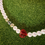 'God is love' pearl necklace